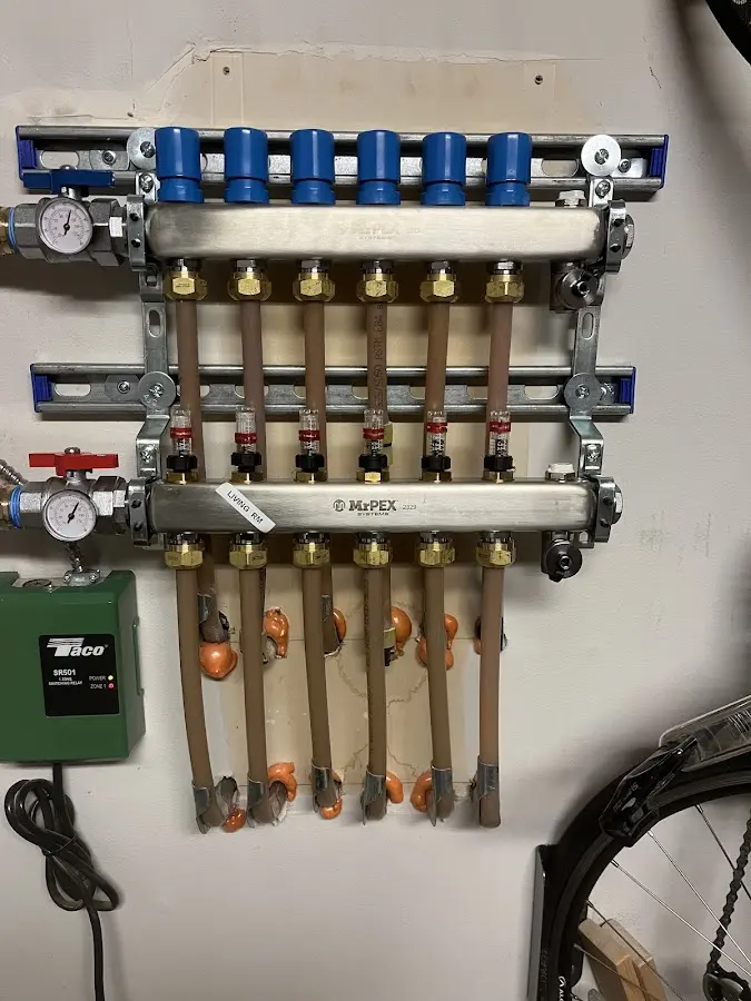 Plumber performing Gas Line Installation at a residential property in Short Pump